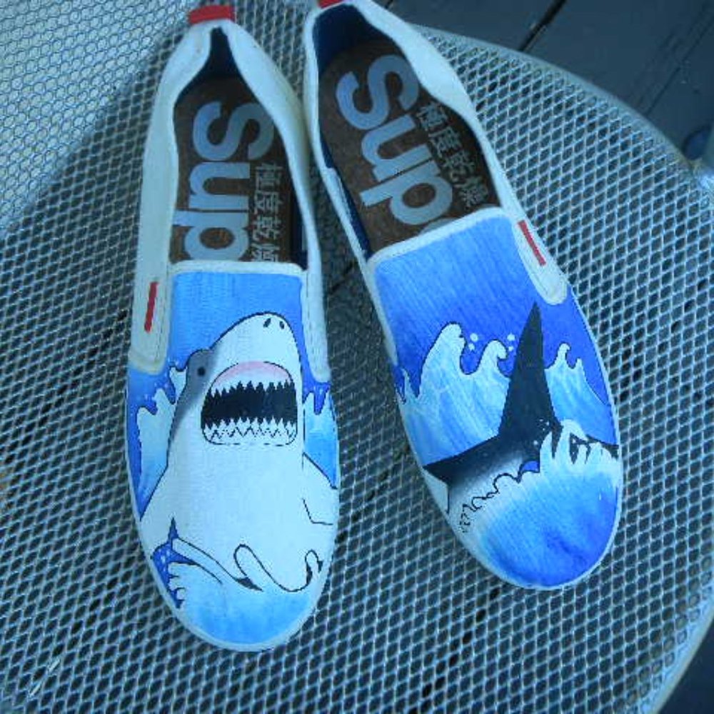 Artist hand painted sneakers themed by movie "Jaws"